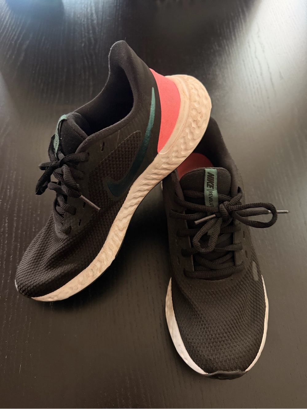 Nike Men’s Black Running Shoes with Coral and Teal Accents